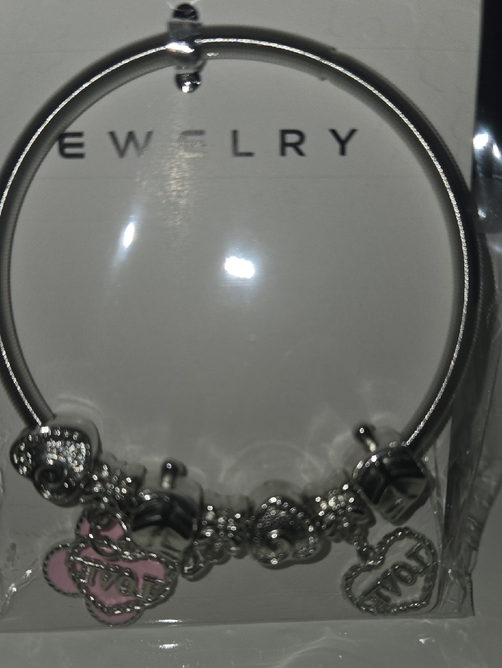 Silver Tone Charm Bangle Bracelet with Pink Accents